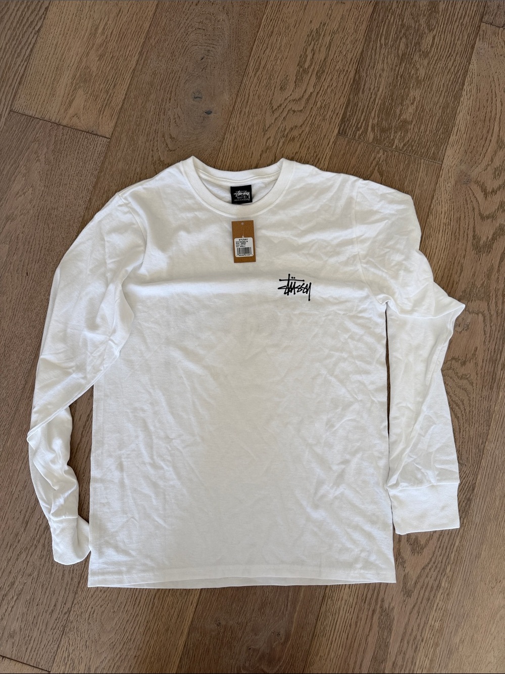 Stussy White Long Sleeve Tee with Black Script Logo